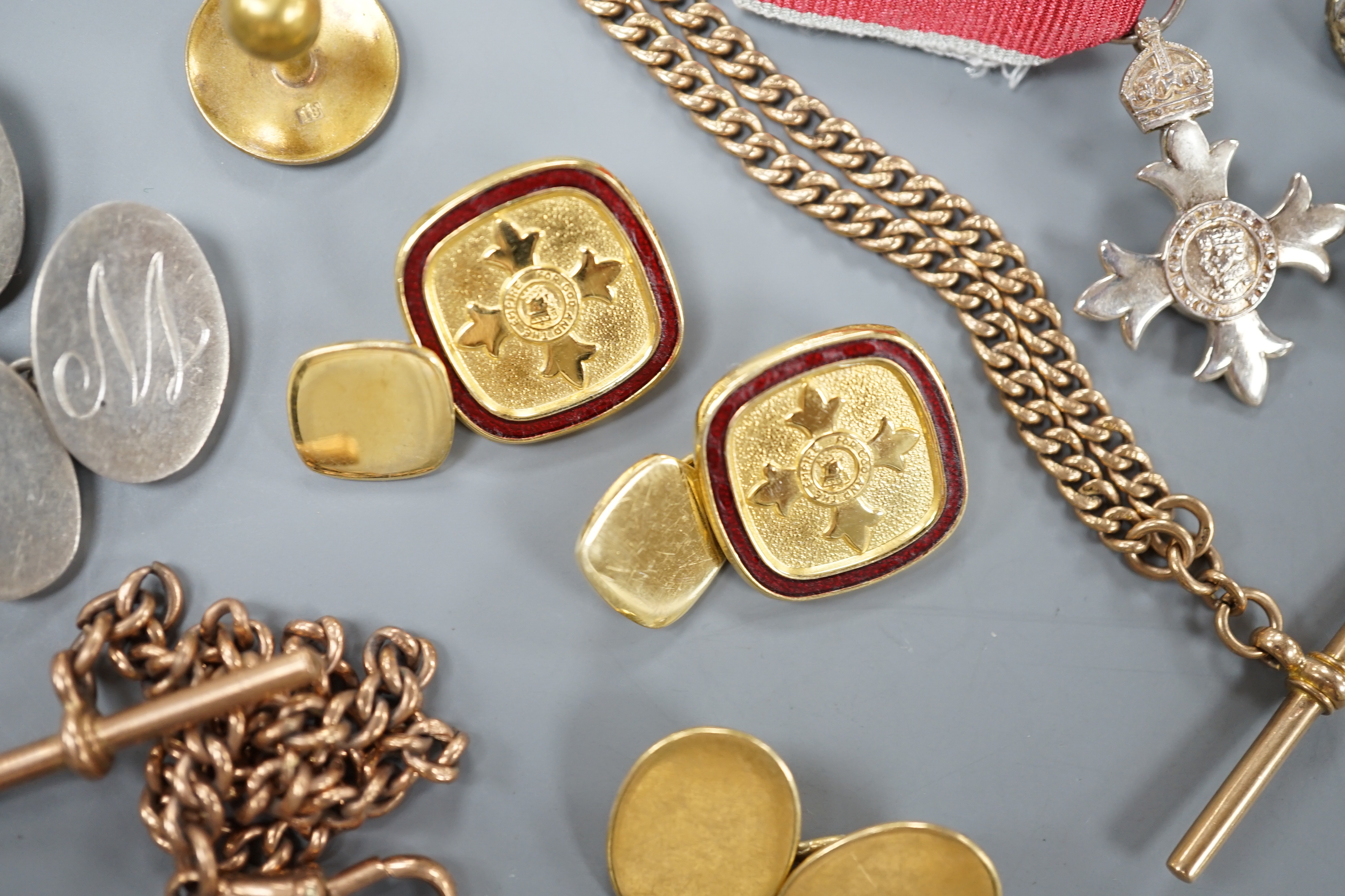 A modern pair of silver gilt and enamel cufflinks, an Edwardian 9ct gold albert, 41cm, 17.9 grams, a smaller 9ct gold albert, 19.5cm, 10.6 grams, an 18ct gold cufflink and dress stud stamped 18, gross 8.4 grams, two othe